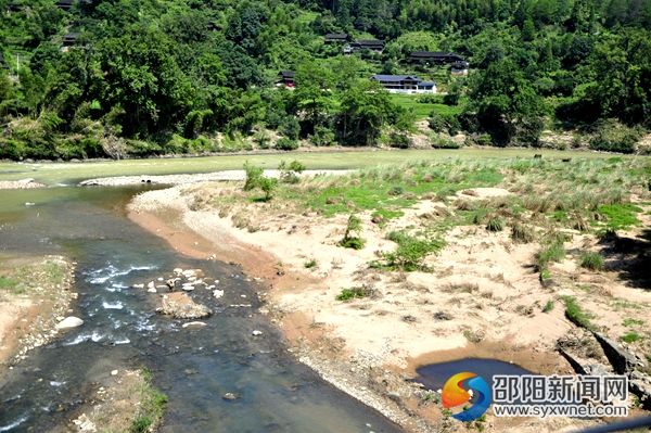 3、趙秀竹泅水救采蕨村民的巫水河河灘