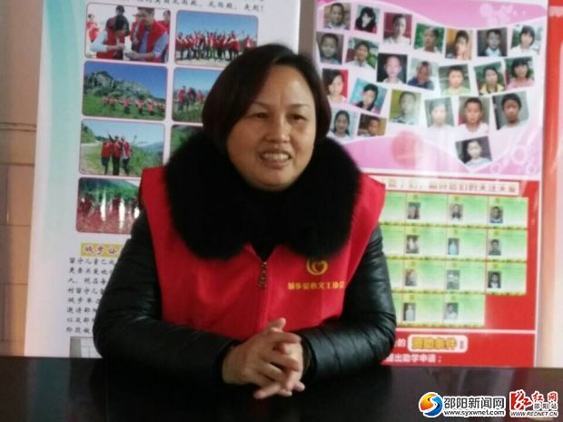 图为城步爱心义工协会名誉会长在总结