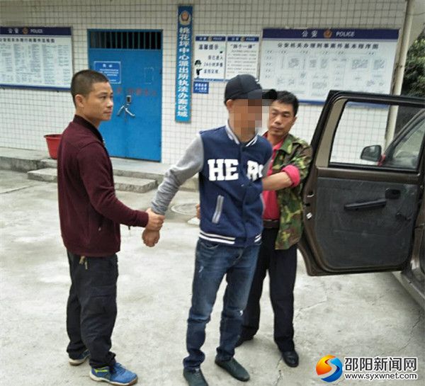 图为抓获的盗车贼阳某