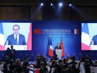 奥朗德出席中国企业家论坛 与马云王健林自拍