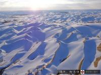 航拍塔克拉玛干沙漠雪景 宛若童话世界