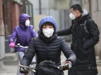 图片故事：雾霾红警下的北京日常