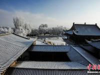 组图：甘肃嘉峪关雪中雄关美如画