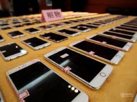 郑州打掉128个盗抢骗团伙 数百部手机现场发放