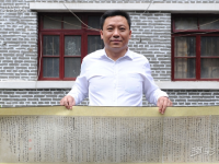 贵州铜仁一党员手抄党章13米书法长卷