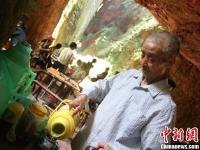 老人景区山腰设免费茶摊 二十三年如一日