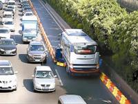 深圳设全国首台潮汐车道“拉链车”治堵