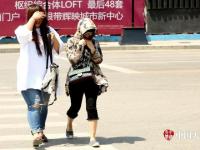 大范围高温来袭 北方多地迎