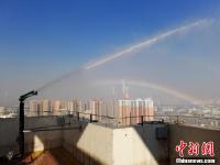 兰州主城区试点高空喷洒抑尘