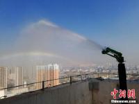 兰州主城区试点高空喷洒抑尘