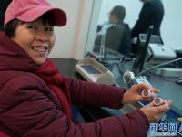  央行狗年纪念币今起兑换