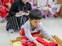  举办生活技能比赛 提高儿童生活能力