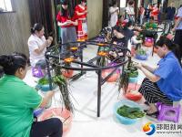 “我们的节日·端午”包粽子比赛举行