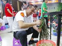 “我们的节日·端午”包粽子比赛举行