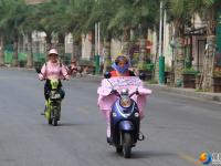 高温炙烤 市民“全副武装”出行