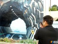 大祥区罗塘村3D立体画“跳”上村民围墙